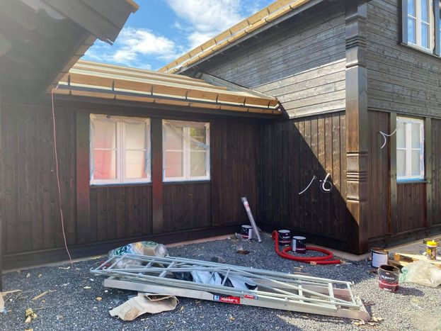 Utskiftning av et tak på et hus